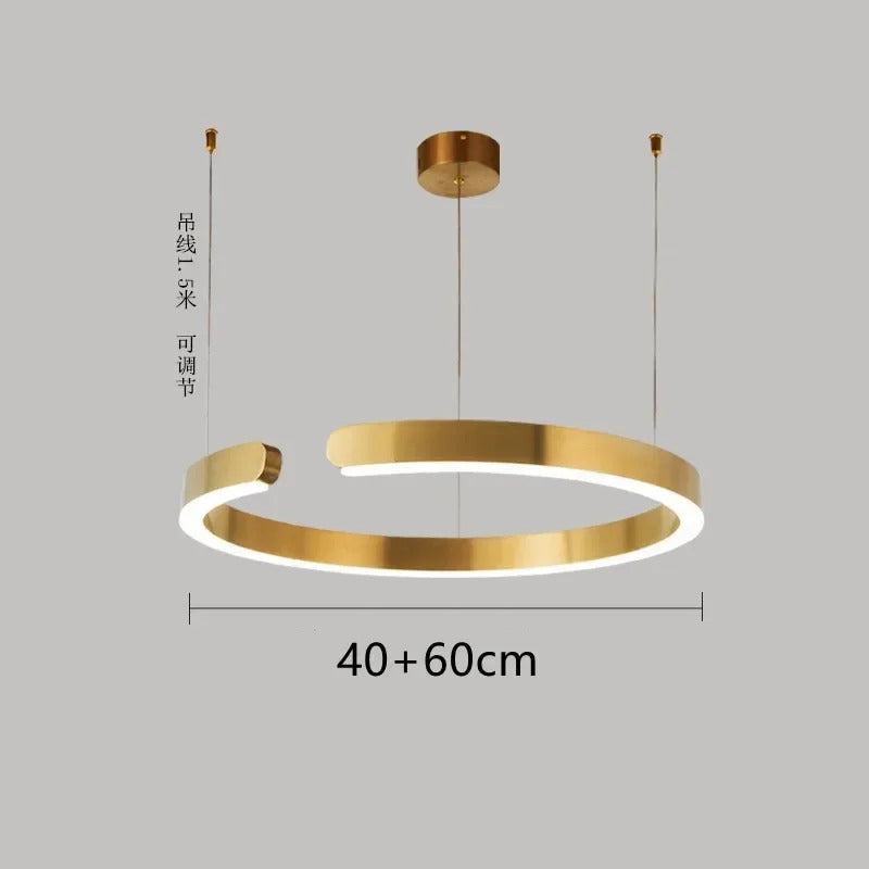 Moderno candeeiro suspenso LED em formato de anel, com intensidade regulável, nas cores dourado e preto, ideal para mesas, salas de jantar, cozinhas e quartos. Design minimalista e elegante. 
