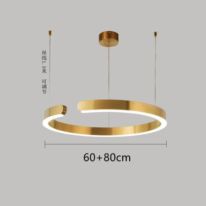 Moderno candeeiro suspenso LED em formato de anel, com intensidade regulável, nas cores dourado e preto, ideal para mesas, salas de jantar, cozinhas e quartos. Design minimalista e elegante. 