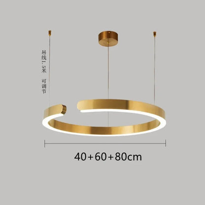 Moderno candeeiro suspenso LED em formato de anel, com intensidade regulável, nas cores dourado e preto, ideal para mesas, salas de jantar, cozinhas e quartos. Design minimalista e elegante. 